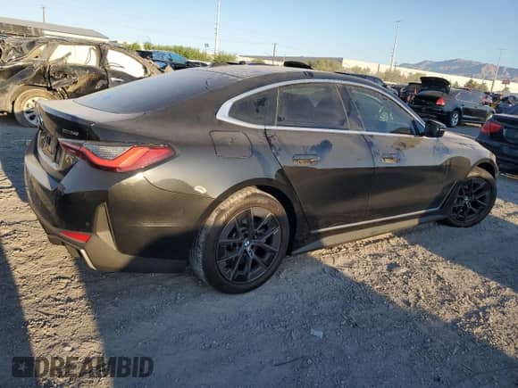 2025 BMW i4 eDrive40 с VIN WBY23HD05SFT89841, выставлен на аукционе Copart как лот 80582955 с пробегом 4 006 миль миль и Списание • Salvage title. История ставок и продаж доступна на DreamBid. Изображение 3.