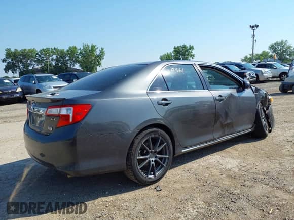 2013 Toyota Camry LE z VIN 4T1BD1FK4DU069294, wystawiony jako IAAI lot #42660361 z przebiegiem 189 304 mil mil oraz . Historia ofert i sprzedaży dostępna na DreamBid. Obrazek 4.