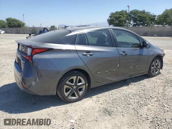 2019 Toyota Prius L Eco с VIN JTDKARFU2K3090595, выставлен на аукционе Copart как лот 69385105 с пробегом 195 378 миль миль и Списание • Salvage title. История ставок и продаж доступна на DreamBid. Изображение 3.