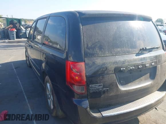 2013 Dodge Grand Caravan American Value with VIN 2C4RDGBG1DR601010, listed as a IAAI auction lot 43293889 with 156,529 mi miles and . Bid and sale history available at DreamBid. Image 3.