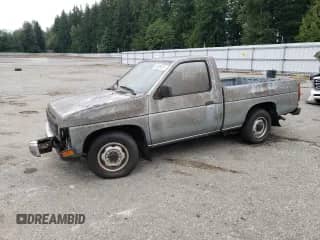 1992 Nissan Frontier z VIN 1N6SD11S1NC373800, wystawiony jako Copart lot #66038324 z przebiegiem 164 126 mil mil oraz Czysty tytuł • Clean title. Historia ofert i sprzedaży dostępna na DreamBid. Obrazek 1.