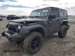 2016 Jeep Wrangler Willys Wheeler z VIN 1C4AJWAG1GL242711, wystawiony jako Copart lot #85337295 z przebiegiem 122 389 mil mil oraz Szkoda całkowita • Salvage title. Historia ofert i sprzedaży dostępna na DreamBid. Obrazek 1.