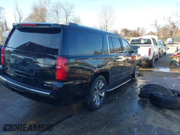 2018 Chevrolet Suburban Premier z VIN 1GNSKJKCXJR134700, wystawiony jako IAAI lot #41282040 z przebiegiem 105 554 mil mil oraz . Historia ofert i sprzedaży dostępna na DreamBid. Obrazek 4.