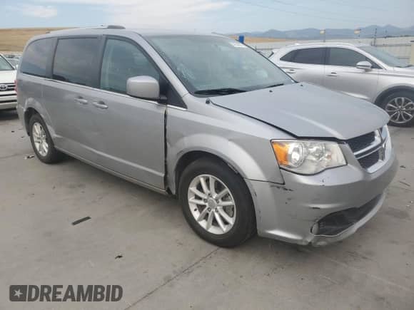 2018 Dodge Grand Caravan SXT with VIN 2C4RDGCG7JR265096, listed as a Copart auction lot 67654465 with 142,250 mi miles and Salvage title. Bid and sale history available at DreamBid. Image 4.
