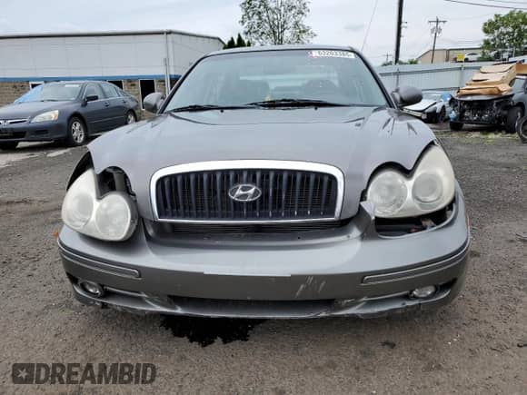 2003 Hyundai Sonata GLS z VIN KMHWF35H43A871938, wystawiony jako Copart lot #63203385 z przebiegiem 85 449 mil mil oraz Szkoda całkowita • Salvage title. Historia ofert i sprzedaży dostępna na DreamBid. Obrazek 5.