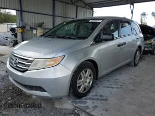2013 Honda Odyssey LX with VIN 5FNRL5H27DB052198, listed as a Copart auction lot 85646085 with 130,530 mi miles and Salvage title. Bid and sale history available at DreamBid. Image 1.