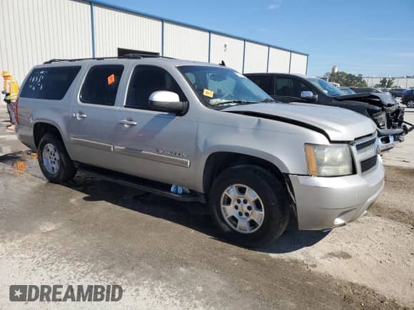 2009 Chevrolet Suburban 1LT z VIN 1GNFC26029R211530, wystawiony jako Copart lot #75316844 z przebiegiem Nie podano mil oraz Szkoda całkowita • Salvage title. Historia ofert i sprzedaży dostępna na DreamBid. Obrazek 4.