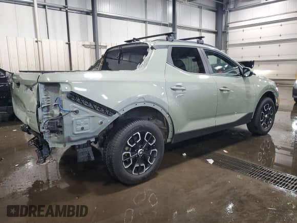 2023 Hyundai Santa Cruz SEL Premium with VIN 5NTJDDAFXPH046596, listed as a Copart auction lot 56195075 with 50,808 mi miles and Salvage title. Bid and sale history available at DreamBid. Image 3.