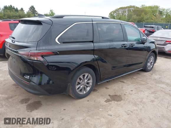 2023 Toyota Sienna LE with VIN 5TDKSKFC2PS084975, listed as a IAAI auction lot 42334415 with 30,886 mi miles and . Bid and sale history available at DreamBid. Image 4.