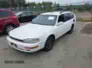 1993 Toyota Camry with VIN 4T1SK12W4PU318891, listed as a IAAI auction lot 42681724 with 294,046 mi miles and . Bid and sale history available at DreamBid. Image 2.