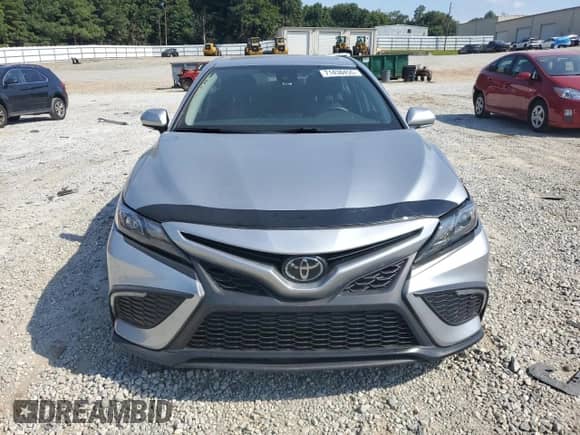 2024 Toyota Camry SE with VIN 4T1G11AKXRU889778, listed as a Copart auction lot 71438455 with 14,238 mi miles and Salvage title. Bid and sale history available at DreamBid. Image 5.