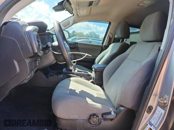 2020 Toyota Tacoma SR5 z VIN 3TMCZ5AN1LM311240, wystawiony jako Copart lot #85188965 z przebiegiem 149 027 mil mil oraz Szkoda całkowita • Salvage title. Historia ofert i sprzedaży dostępna na DreamBid. Obrazek 7.