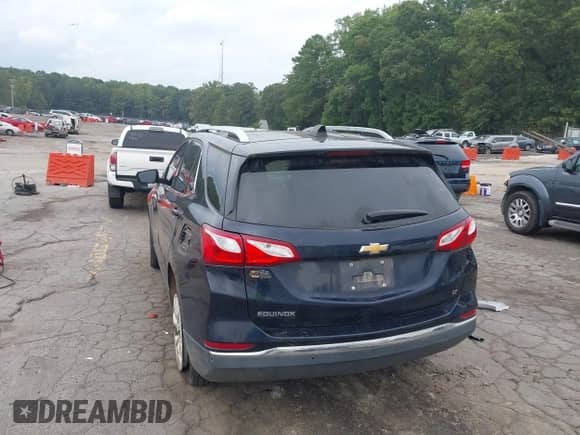 2020 Chevrolet Equinox LT with VIN 3GNAXKEV5LS739000, listed as a IAAI auction lot 43323828 with 130,613 mi miles and . Bid and sale history available at DreamBid. Image 3.