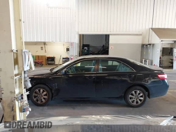 2008 Toyota Camry LE with VIN 4T4BE46K88R042058, listed as a IAAI auction lot 43052267 with 251,826 mi miles and . Bid and sale history available at DreamBid. Image 14.