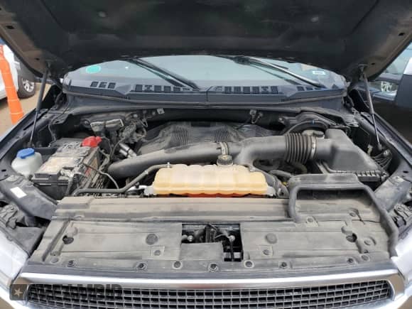 2019 Ford F-150 XL z VIN 1FTEW1E49KFA35741, wystawiony jako Copart lot #59946385 z przebiegiem Nie podano mil oraz Szkoda całkowita • Salvage title. Historia ofert i sprzedaży dostępna na DreamBid. Obrazek 11.