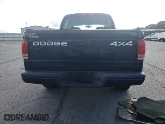 2002 Dodge Dakota Sport с VIN 1B7HG38N82S517165, выставлен на аукционе Copart как лот 61051735 с пробегом 133 982 миль миль и Списание • Salvage title. История ставок и продаж доступна на DreamBid. Изображение 6.