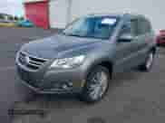 2011 Volkswagen Tiguan S with VIN WVGBV7AX1BW537860, listed as a IAAI auction lot 43047660 with 93,764 mi miles and . Bid and sale history available at DreamBid. Image 2.