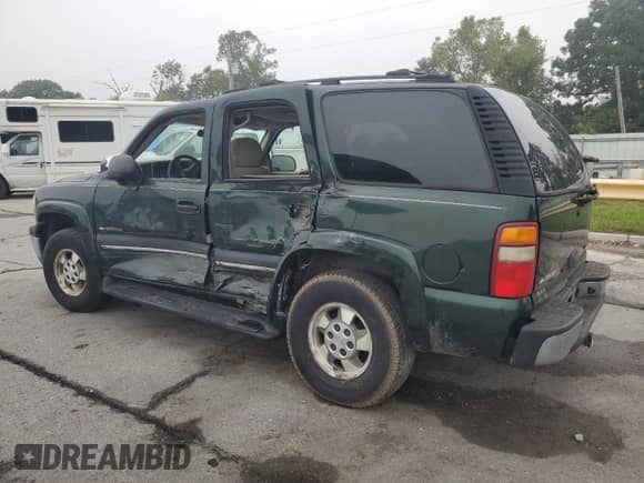 2002 Chevrolet Tahoe Z71 с VIN 1GNEK13Z52R325832, выставлен на аукционе Copart как лот 71494415 с пробегом Не указан миль и Списание • Salvage title. История ставок и продаж доступна на DreamBid. Изображение 2.
