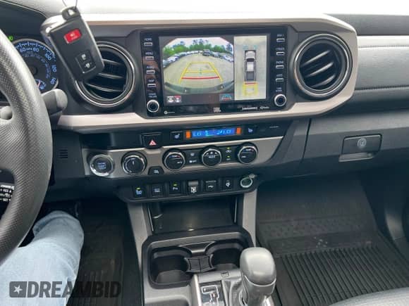 2022 Toyota Tacoma Limited с VIN 3TMGZ5AN7NM458988, выставлен на аукционе Copart как лот 65398105 с пробегом 32 115 миль миль и Списание • Salvage title. История ставок и продаж доступна на DreamBid. Изображение 9.