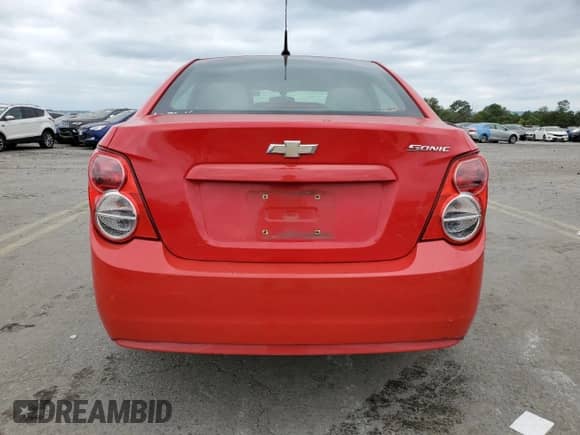 2014 Chevrolet Sonic LS z VIN 1G1JB5SH5E4161144, wystawiony jako Copart lot #69678114 z przebiegiem 152 052 mil mil oraz Szkoda całkowita • Salvage title. Historia ofert i sprzedaży dostępna na DreamBid. Obrazek 6.