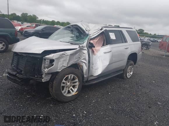 2019 Chevrolet Tahoe LS with VIN 1GNSKAKC2KR185738, listed as a IAAI auction lot 42325196 with Not provided miles and . Bid and sale history available at DreamBid. Image 2.