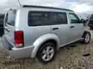 2010 Dodge Nitro SXT with VIN 1D4PT5GK3AW131922, listed as a Copart auction lot 51238695 with 158,434 mi miles and Salvage title. Bid and sale history available at DreamBid. Image 3.