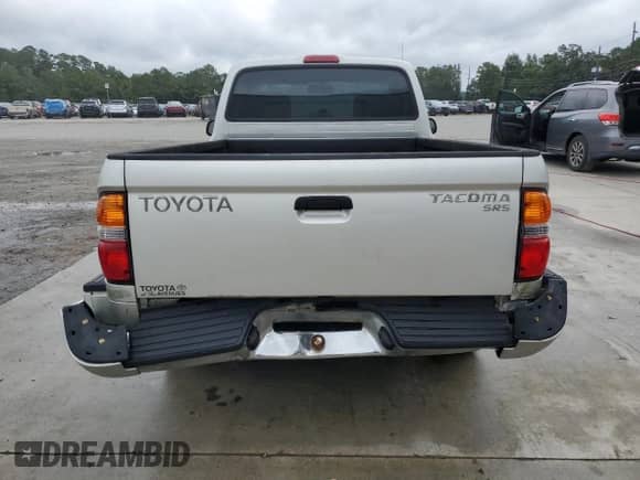 2002 Toyota Tacoma с VIN 5TENL42N42Z010806, выставлен на аукционе Copart как лот 84645105 с пробегом 199 343 миль миль и Списание • Salvage title. История ставок и продаж доступна на DreamBid. Изображение 6.