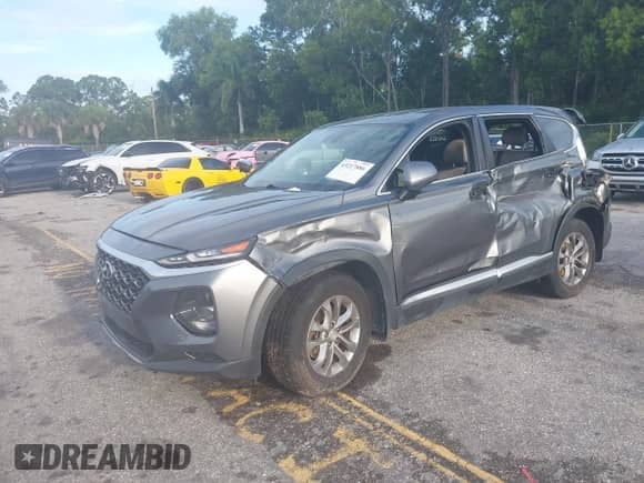 2020 Hyundai Santa Fe SE with VIN 5NMS23AD7LH141027, listed as a IAAI auction lot 43217886 with 138,225 mi miles and . Bid and sale history available at DreamBid. Image 17.