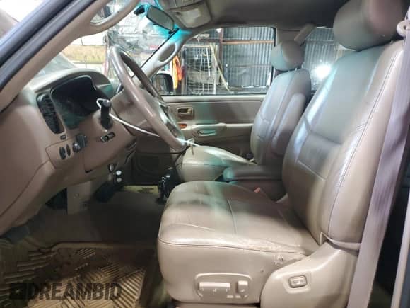 2001 Toyota Tundra Limited z VIN 5TBBT48141S154805, wystawiony jako Copart lot #66225125 z przebiegiem 216 119 mil mil oraz Czysty tytuł • Clean title. Historia ofert i sprzedaży dostępna na DreamBid. Obrazek 7.