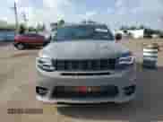 2020 Jeep Grand Cherokee SRT with VIN 1C4RJFDJ8LC158048, listed as a Copart auction lot 57426205 with 52,979 mi miles and Salvage title. Bid and sale history available at DreamBid. Image 5.