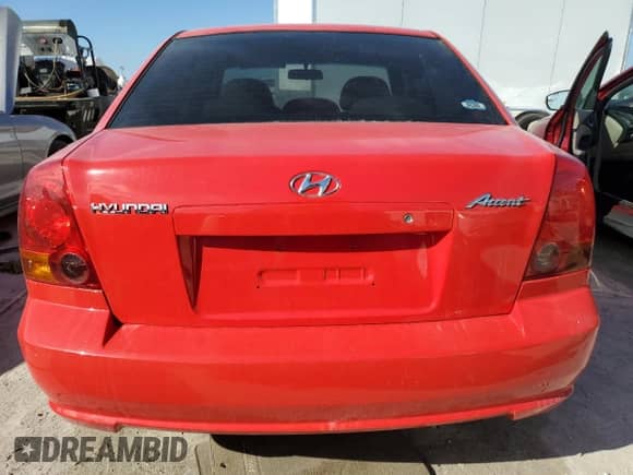 2005 Hyundai Accent GLS с VIN KMHCG45C15U596671, выставлен на аукционе Copart как лот 74834004 с пробегом Не указан миль и Списание • Salvage title. История ставок и продаж доступна на DreamBid. Изображение 6.