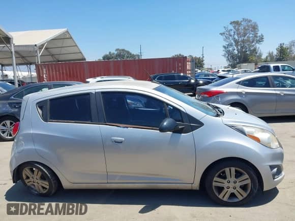2014 Chevrolet Spark LT z VIN KL8CD6S95EC510892, wystawiony jako IAAI lot #42865605 z przebiegiem 112 138 mil mil oraz . Historia ofert i sprzedaży dostępna na DreamBid. Obrazek 13.