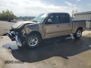 2003 Ford F-150 XLT with VIN 1FTRW07L43KB71901, listed as a Copart auction lot 85125505 with 69,569 mi miles and Salvage title. Bid and sale history available at DreamBid. Image 1.