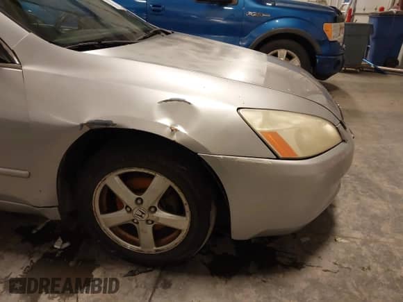 2003 Honda Accord EX z VIN 1HGCM55663A071098, wystawiony jako IAAI lot #41013542 z przebiegiem 231 014 mil mil oraz . Historia ofert i sprzedaży dostępna na DreamBid. Obrazek 18.