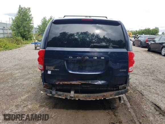 2014 Dodge Grand Caravan Crew z VIN 2C4RDGDG0ER327345, wystawiony jako Copart lot #66422375 z przebiegiem 221 569 mil mil oraz Czysty tytuł • Clean title. Historia ofert i sprzedaży dostępna na DreamBid. Obrazek 6.