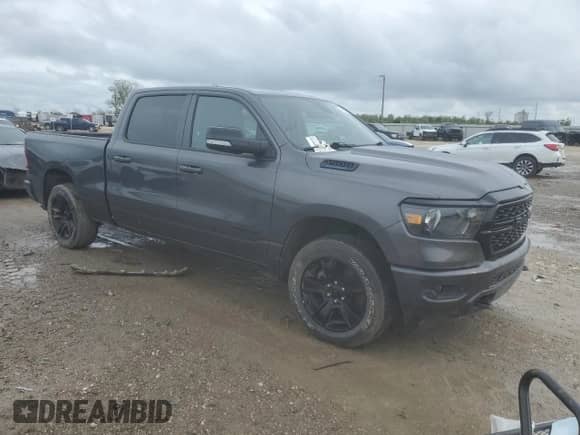 2022 Ram 1500 Big Horn with VIN 1C6RRFMG0NN390591, listed as a Copart auction lot 49462835 with 87,796 mi miles and Salvage title. Bid and sale history available at DreamBid. Image 4.