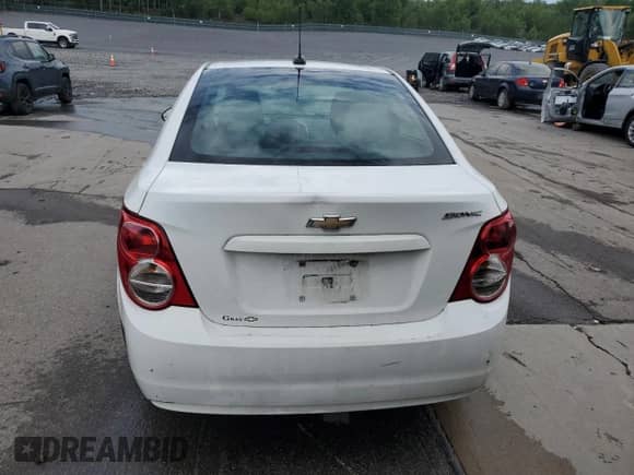2016 Chevrolet Sonic LS с VIN 1G1JA5SG0G4111801, выставлен на аукционе Copart как лот 61747815 с пробегом 166 245 миль миль и Списание • Salvage title. История ставок и продаж доступна на DreamBid. Изображение 6.