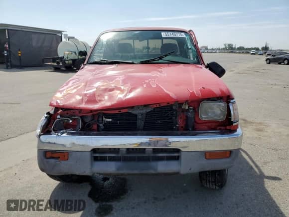 1997 Toyota Tacoma z VIN 4TAWN72N2VZ264266, wystawiony jako Copart lot #55149775 z przebiegiem 245 769 mil mil oraz Szkoda całkowita • Salvage title. Historia ofert i sprzedaży dostępna na DreamBid. Obrazek 5.