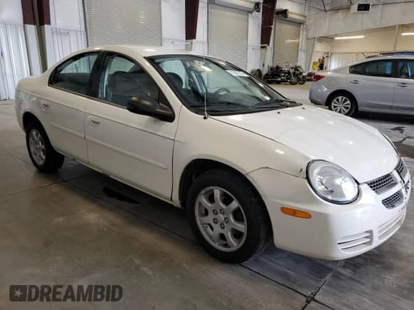 2005 Dodge Neon SXT with VIN 1B3ES56C25D180906, listed as a Copart auction lot 71847705 with 171,978 mi miles and Salvage title. Bid and sale history available at DreamBid. Image 4.