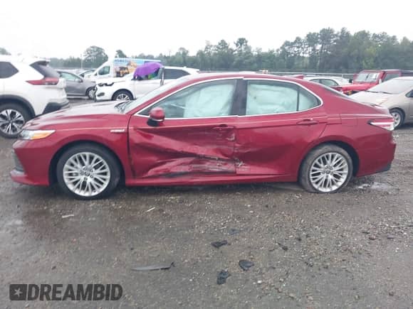 2020 Toyota Camry Hybrid XLE with VIN 4T1F31AK5LU016727, listed as a IAAI auction lot 42885382 with 14,854 mi miles and . Bid and sale history available at DreamBid. Image 14.