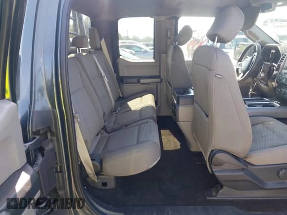 2018 Ford F-150 XLT z VIN 1FTEX1EP5JKD65356, wystawiony jako IAAI lot #43290503 z przebiegiem 75 709 mil mil oraz . Historia ofert i sprzedaży dostępna na DreamBid. Obrazek 8.