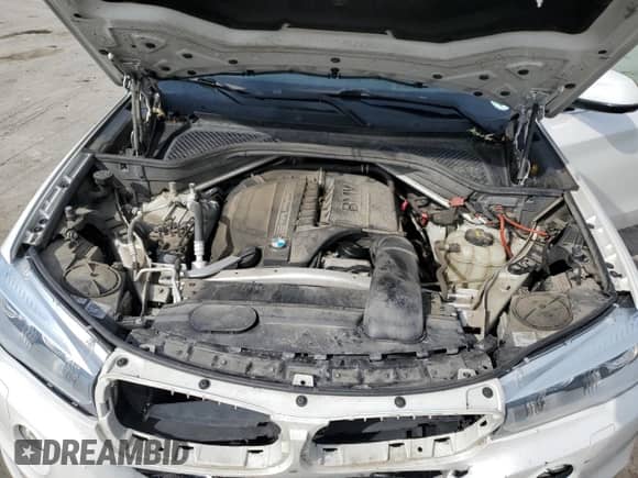 2017 BMW X5 xDrive35i with VIN 5UXKR0C5XH0U50500, listed as a Copart auction lot 84577295 with 105,740 mi miles and Salvage title. Bid and sale history available at DreamBid. Image 12.