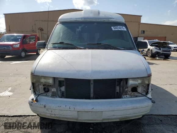 1999 Chevrolet Astro Cargo YF7 z VIN 1GBDM19WXXB133774, wystawiony jako Copart lot #50024015 z przebiegiem 240 716 mil mil oraz Szkoda całkowita • Salvage title. Historia ofert i sprzedaży dostępna na DreamBid. Obrazek 5.