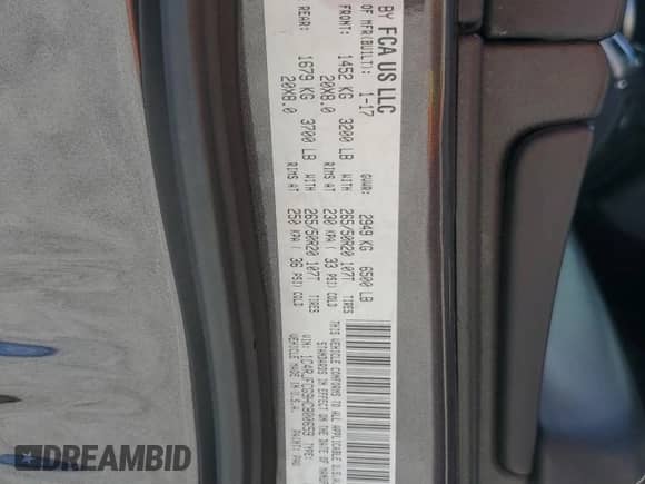 2017 Jeep Grand Cherokee Overland with VIN 1C4RJFCG9HC800659, listed as a Copart auction lot 67804285 with 105,483 mi miles and Salvage title. Bid and sale history available at DreamBid. Image 13.