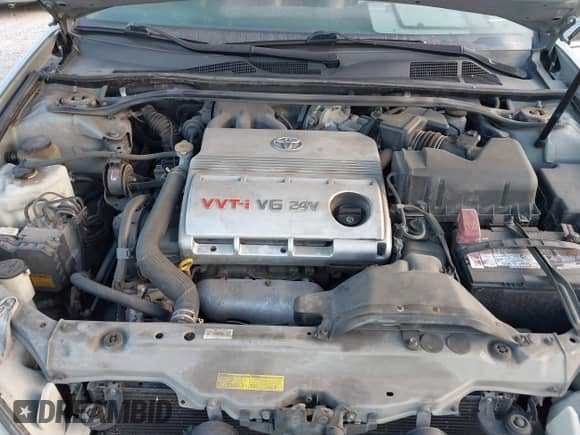 2005 Toyota Camry XLE with VIN 4T1BF30K95U613997, listed as a IAAI auction lot 43348925 with 122,617 mi miles and . Bid and sale history available at DreamBid. Image 10.