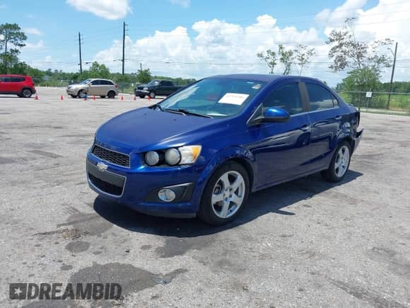 2013 Chevrolet Sonic LTZ with VIN 1G1JE5SH1D4151118, listed as a IAAI auction lot 42714786 with 104,676 mi miles and . Bid and sale history available at DreamBid. Image 2.