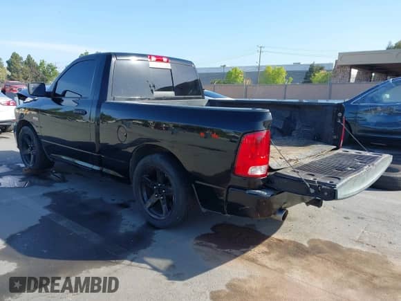 2014 Ram 1500 Express z VIN 3C6JR6ATXEG192303, wystawiony jako IAAI lot #42087281 z przebiegiem 58 597 mil mil oraz . Historia ofert i sprzedaży dostępna na DreamBid. Obrazek 3.