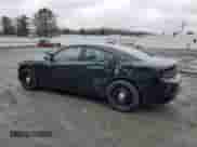 2021 Dodge Charger Police с VIN 2C3CDXKG7MH622217, выставлен на аукционе Copart как лот 50159835 с пробегом 76 825 миль миль и Списание • Salvage title. История ставок и продаж доступна на DreamBid. Изображение 2.