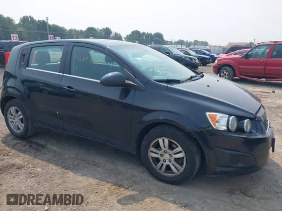 2013 Chevrolet Sonic LT with VIN 1G1JC6SG8D4244494, listed as a IAAI auction lot 42898475 with 74,710 mi miles and . Bid and sale history available at DreamBid. Image 1.