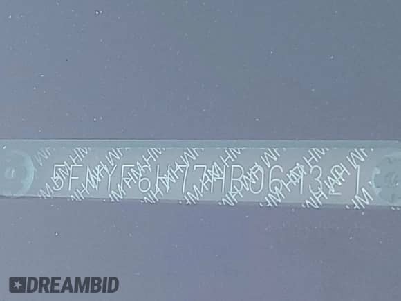 2017 Honda Pilot EX-L with VIN 5FNYF6H77HB069321, listed as a IAAI auction lot 42880282 with 110,987 mi miles and . Bid and sale history available at DreamBid. Image 9.